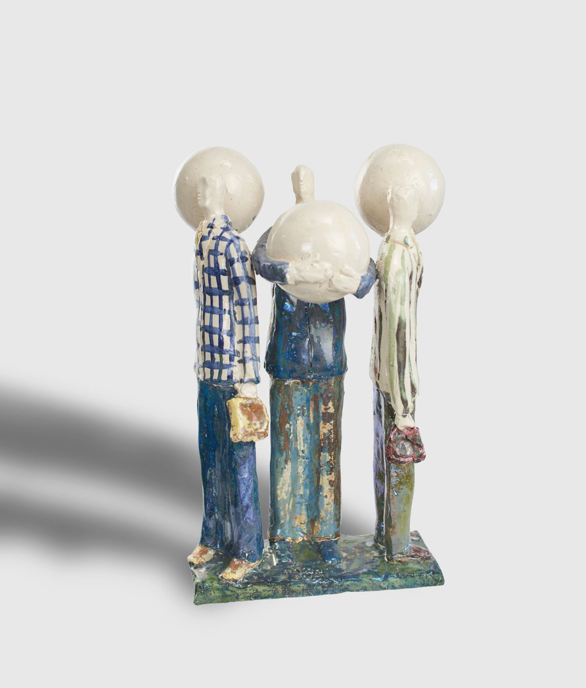 TRE VIAGGIATORE CON PALLA — Keramik   10x44x25cm